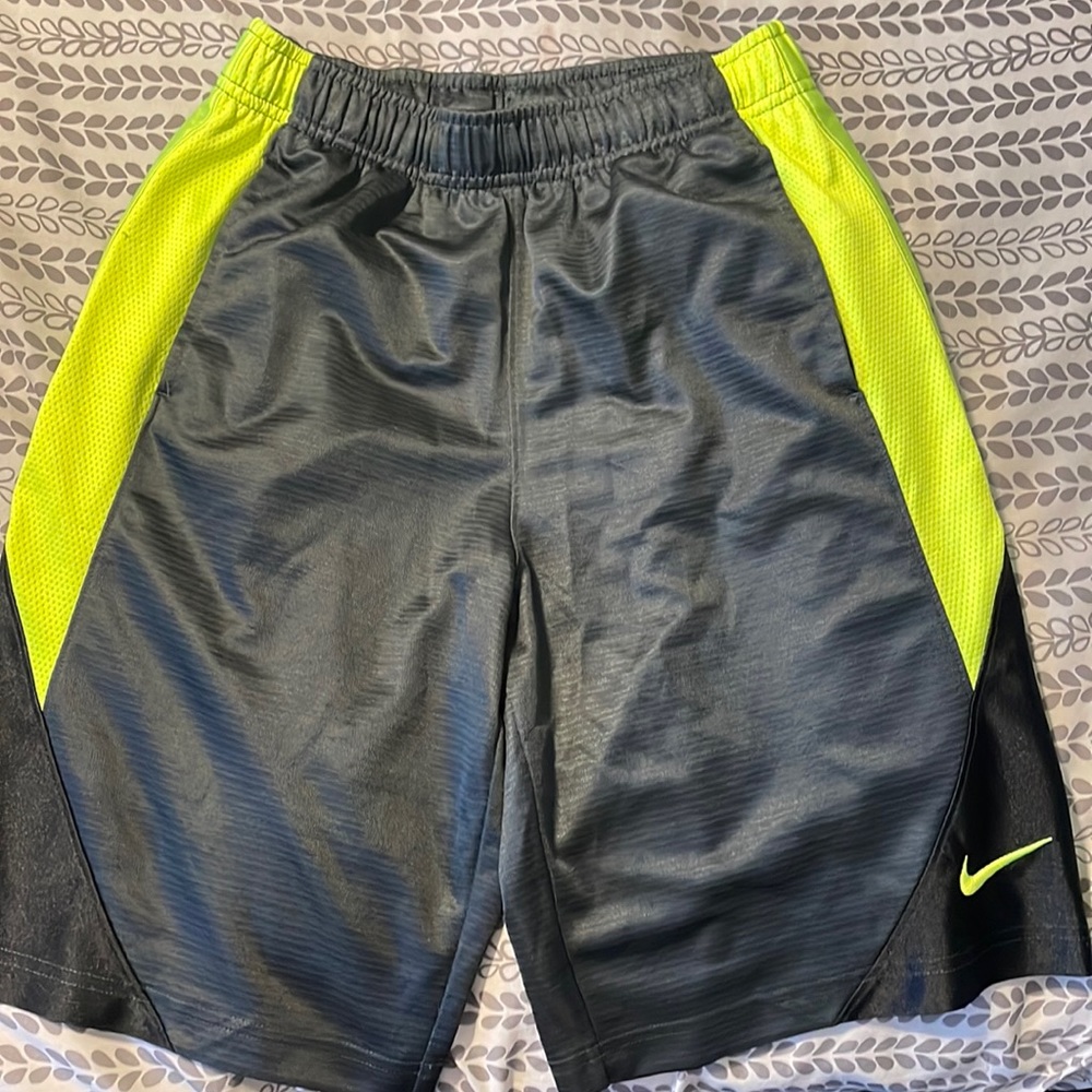 Nike basketball shorts , young men size M.